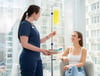 nurse with iv drip