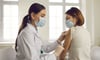 doctor giving flu shot